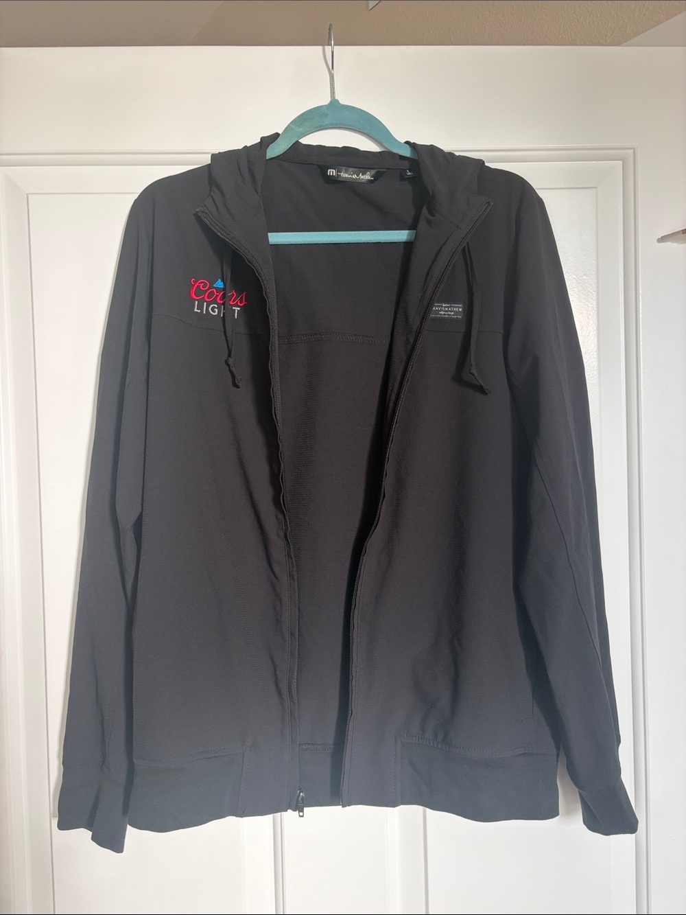 Travis Mathew Black Hooded Lightweight Jacket with Red Accent